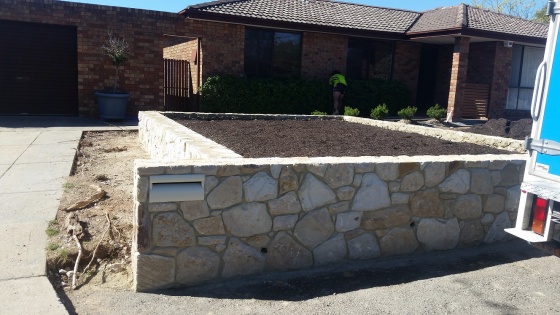 Farr Out Stonemasonry - Retaining Wall and Garden Bed
